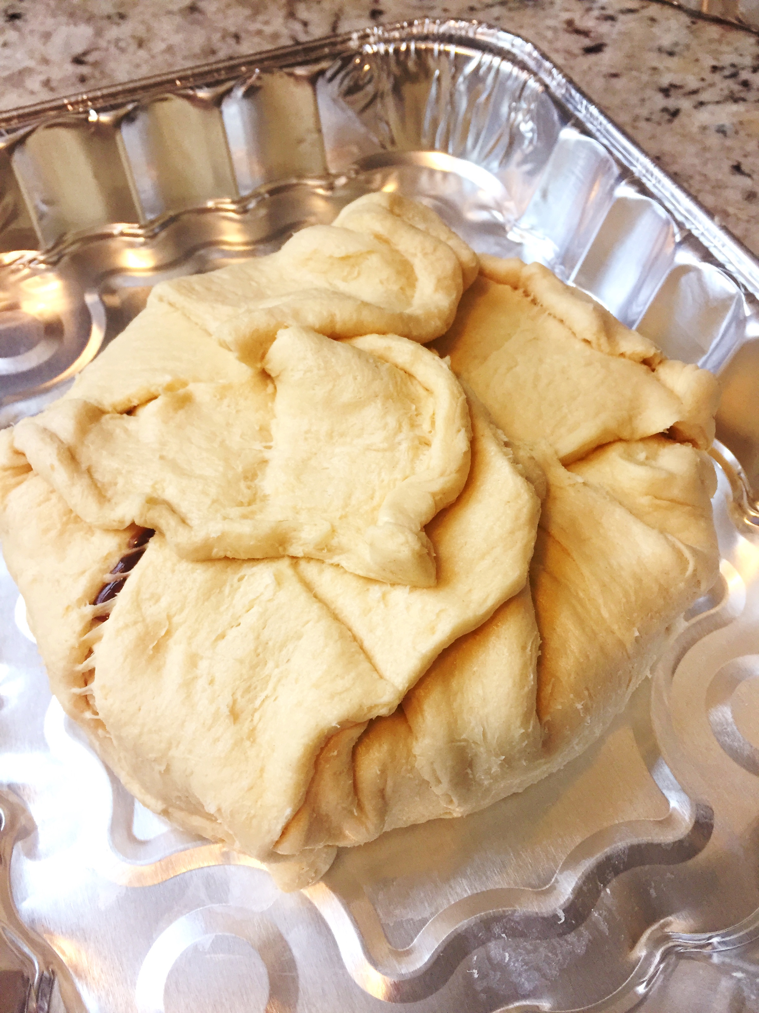 Raspberry Baked Brie on an aluminum disposable pan