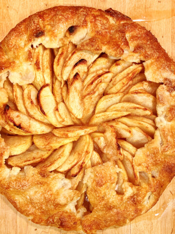 Apple tart on a wood cutting board