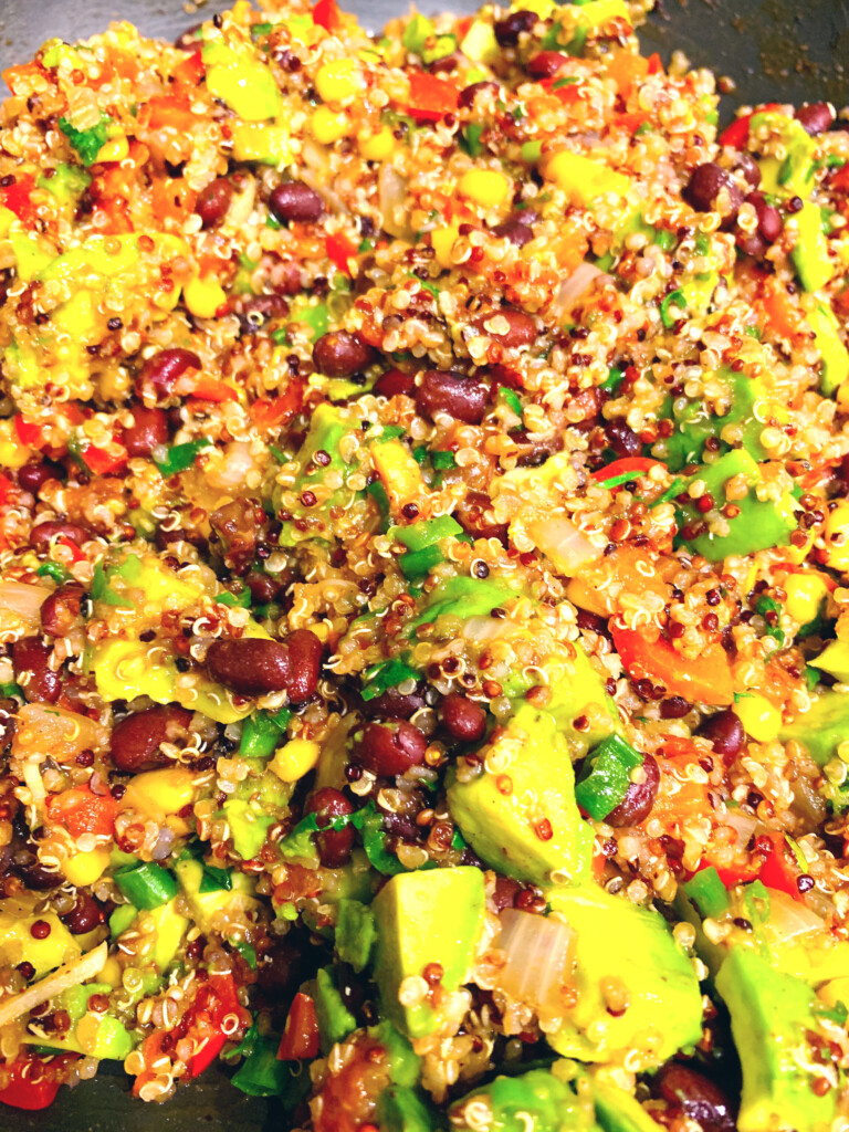 Mexican quinoa with black beans, corn, red bell pepper, avocado, onion, cilantro and tomatoes