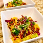 Egg roll in a bowl recipe in a white bowl on a countertop