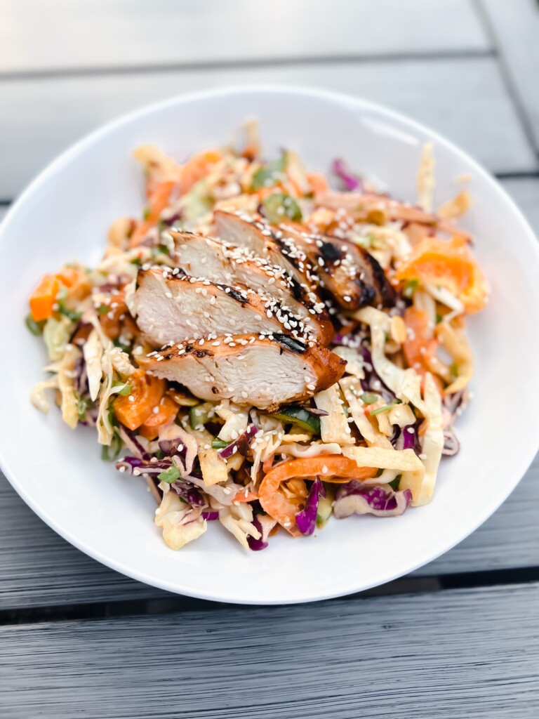 Grilled chicken on a sesame Asian slaw
