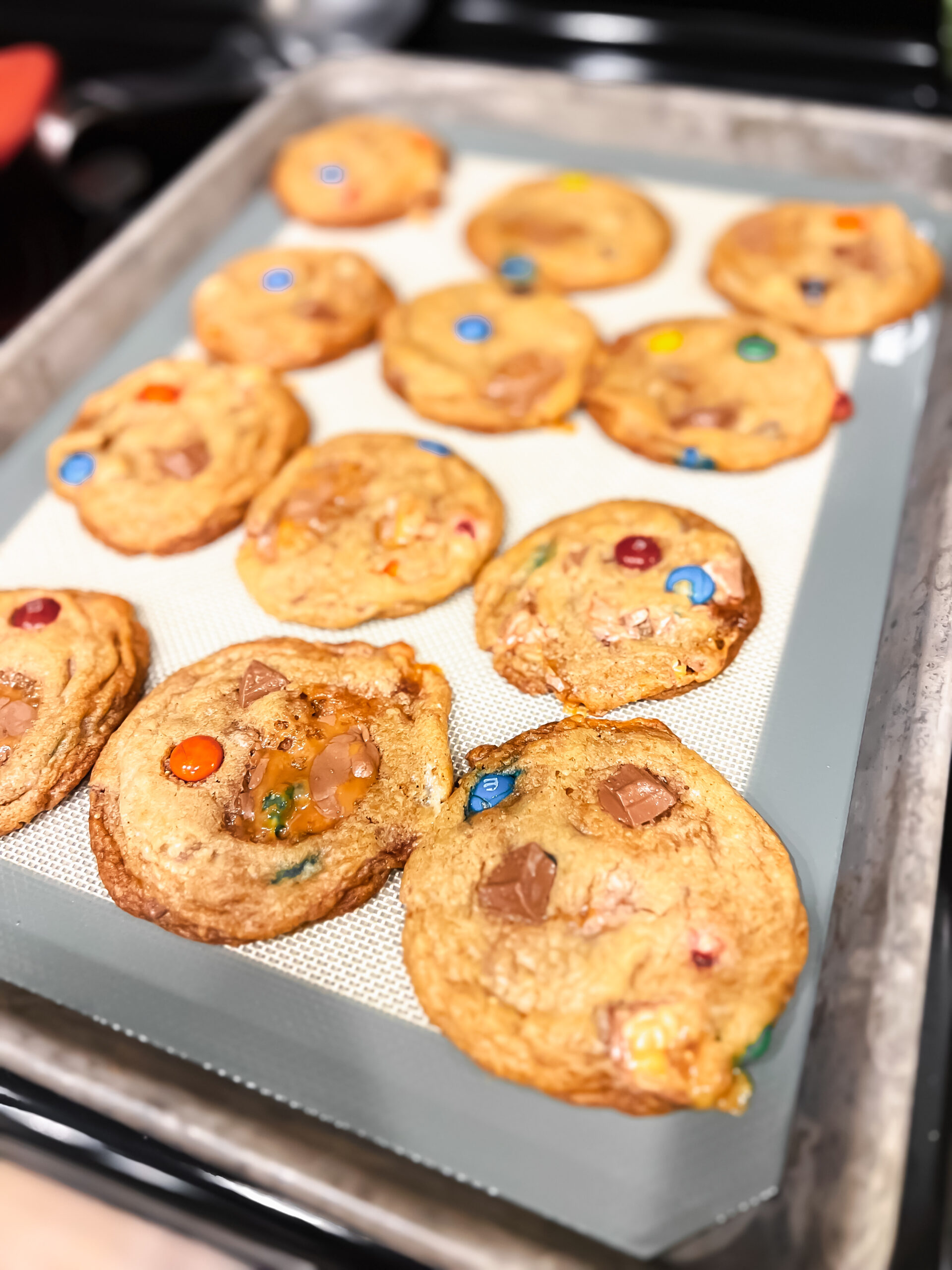 Halloween candy cookies on a sheet pan